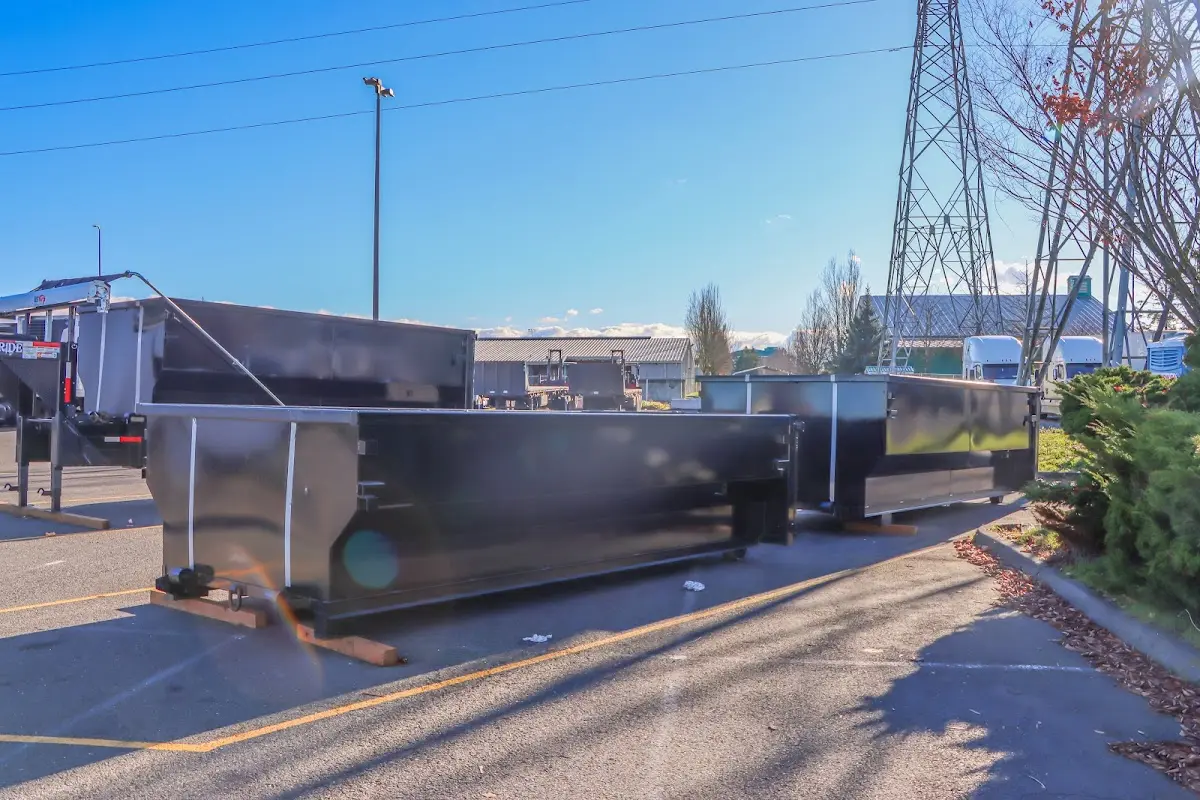 Roll-off dumpster ready for waste disposal at job site for 12 Yard Dumpster Rental in Mantua